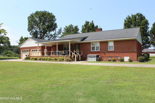 2945 US Highway 17, Williamston, NC 27892 - ranch-style house featuring covered porch, a front lawn, brick siding, a garage, and a chimney