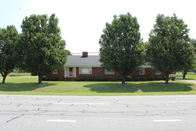 2945 US Highway 17, Williamston, NC 27892 - ranch-style house with a front yard and entry steps