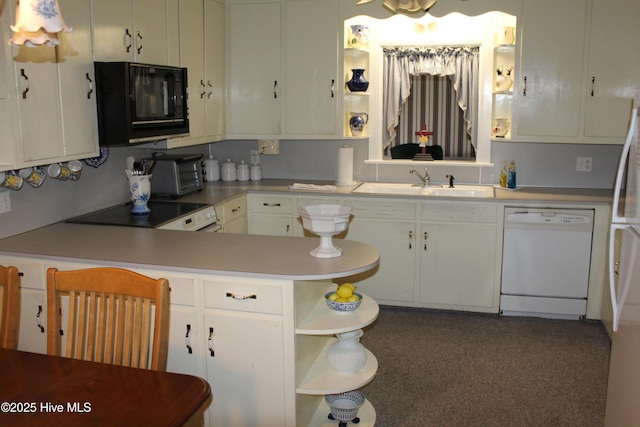 2945 US Highway 17, Williamston, NC 27892 - kitchen featuring dishwasher, black microwave, open shelves, a sink, and range