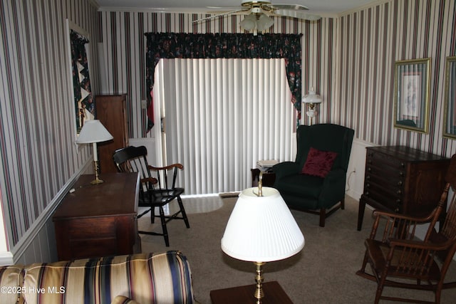 2945 US Highway 17, Williamston, NC 27892 - living area featuring wallpapered walls, a ceiling fan, carpet flooring, and crown molding
