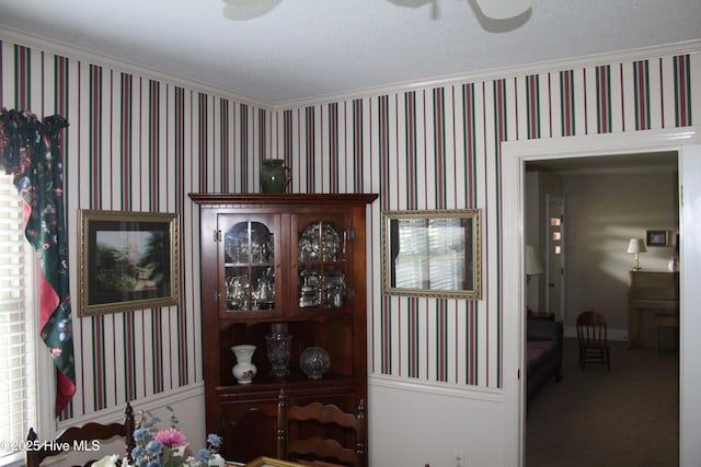 2945 US Highway 17, Williamston, NC 27892 - dining area featuring ornamental molding, a ceiling fan, carpet floors, wallpapered walls, and baseboards