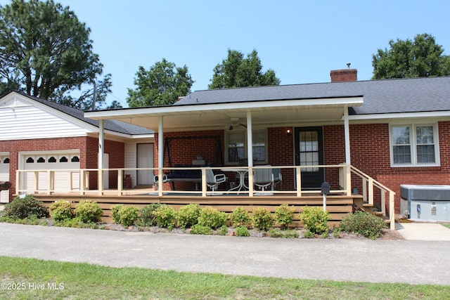 2945 US Highway 17, Williamston, NC 27892 - ranch-style home featuring brick siding, a chimney, covered porch, and cooling unit