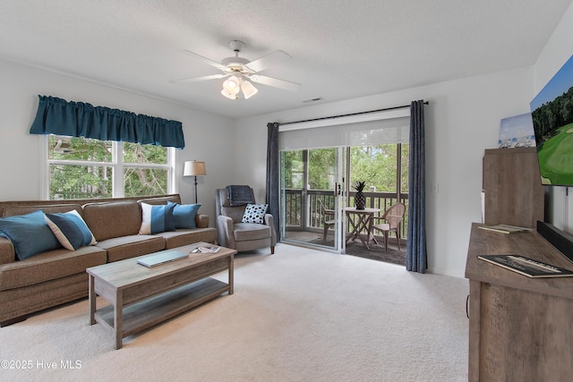 3030 Marsh Winds Cir Unit 605, Southport, NC 28461 - living area with light carpet and a ceiling fan