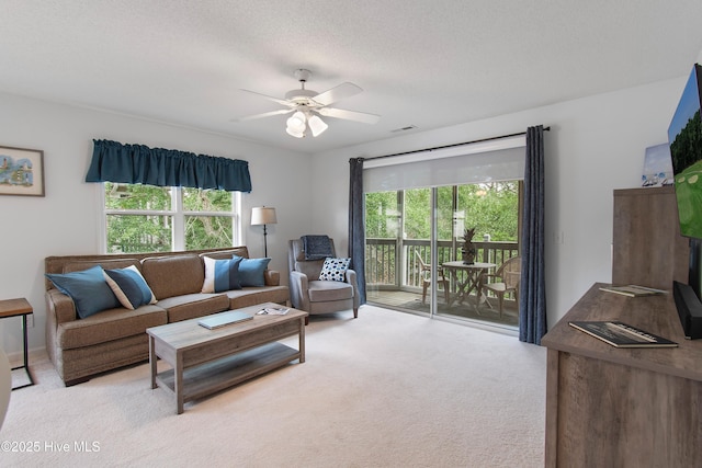 3030 Marsh Winds Cir Unit 605, Southport, NC 28461 - living area with light carpet, plenty of natural light, and ceiling fan