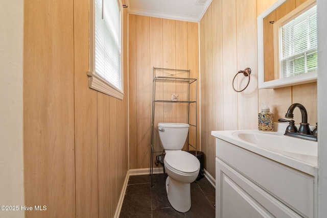 225 Candlewood Dr, Wilmington, NC 28411 - bathroom with vanity, wooden walls, and ornamental molding