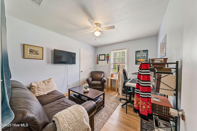 225 Candlewood Dr, Wilmington, NC 28411 - home office featuring ceiling fan, wood finished floors, and a textured ceiling