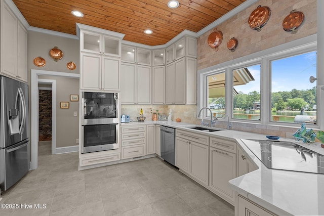 4 Lake Shore Ct, Pinehurst, NC 28374 - kitchen with stainless steel appliances, wood ceiling, crown molding, recessed lighting, and backsplash