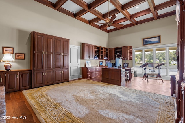 4 Lake Shore Ct, Pinehurst, NC 28374 - kitchen featuring open shelves, a high ceiling, dark wood-style flooring, ceiling fan, and beamed ceiling