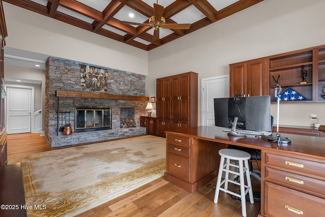 4 Lake Shore Ct, Pinehurst, NC 28374 - office space with light wood-style floors, a ceiling fan, a fireplace, coffered ceiling, and beam ceiling