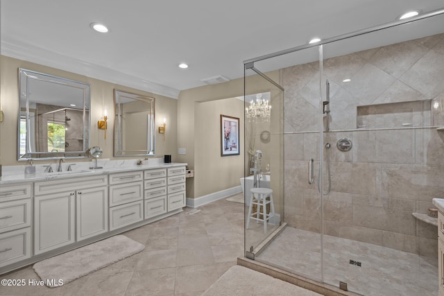 4 Lake Shore Ct, Pinehurst, NC 28374 - bathroom featuring double vanity, a shower stall, recessed lighting, crown molding, and a chandelier