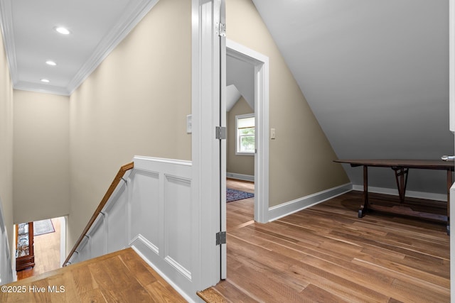 4 Lake Shore Ct, Pinehurst, NC 28374 - hallway with an upstairs landing, wood finished floors, crown molding, and recessed lighting