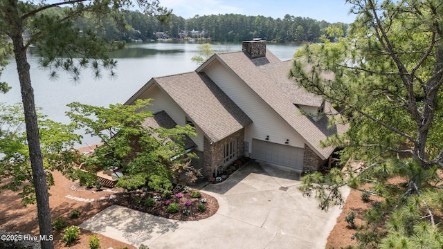 4 Lake Shore Ct, Pinehurst, NC 28374 - view from above of property featuring a nearby body of water and a heavily wooded area
