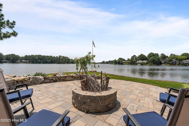 4 Lake Shore Ct, Pinehurst, NC 28374 - view of patio with a fire pit and a water view