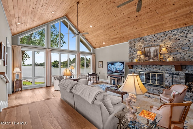 4 Lake Shore Ct, Pinehurst, NC 28374 - living area with ceiling fan, high vaulted ceiling, wooden ceiling, hardwood / wood-style flooring, and a water view