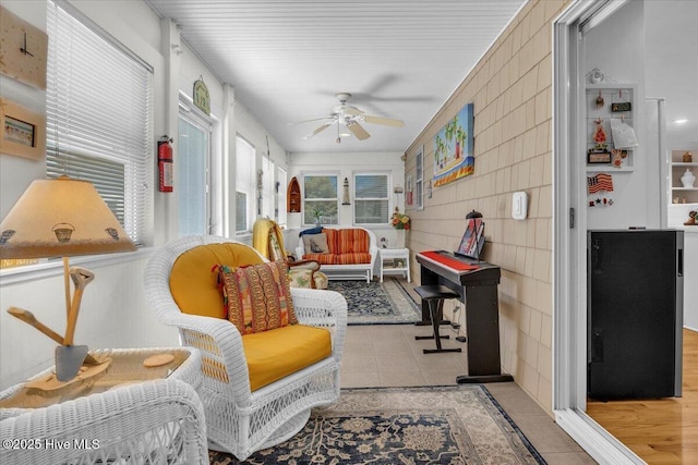 813 Cutter Ct, Kure Beach, NC 28449 - sunroom / solarium featuring tile patterned floors and tile walls