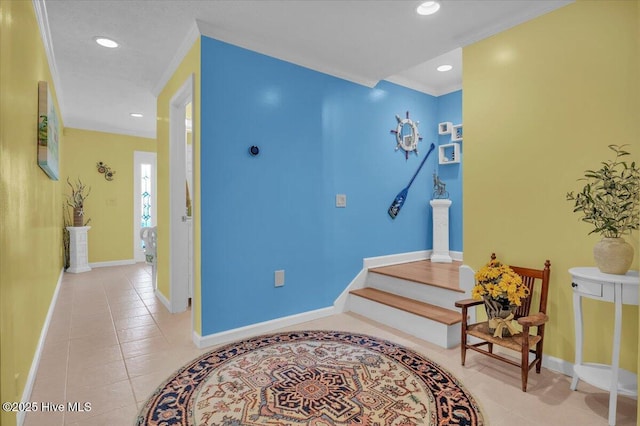 813 Cutter Ct, Kure Beach, NC 28449 - entrance foyer featuring ornamental molding, light tile patterned floors, recessed lighting, and stairway