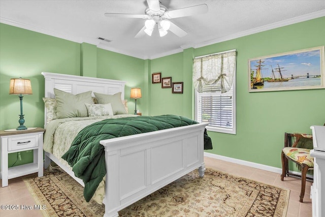 813 Cutter Ct, Kure Beach, NC 28449 - bedroom with crown molding, light tile patterned flooring, a ceiling fan, and a textured ceiling