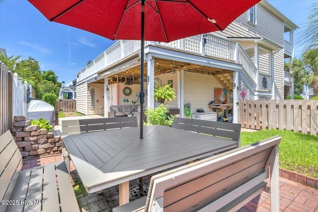 813 Cutter Ct, Kure Beach, NC 28449 - view of patio / terrace featuring stairs, grilling area, and a deck