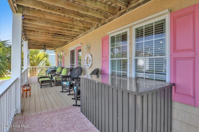 813 Cutter Ct, Kure Beach, NC 28449 - porch with an outdoor hangout area
