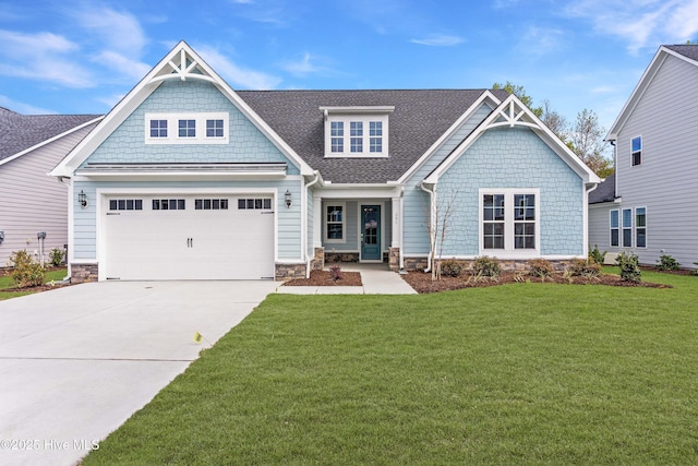 494 Sailor Sky Way Unit 400, Hampstead, NC 28443 - craftsman-style home featuring concrete driveway, an attached garage, a front lawn, and roof with shingles