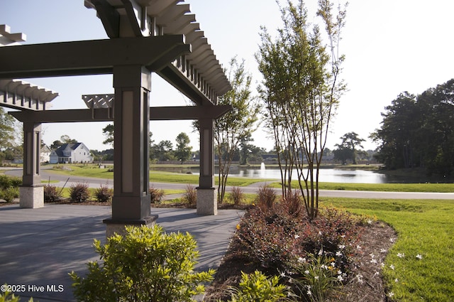 494 Sailor Sky Way Unit 400, Hampstead, NC 28443 - view of home's community with a water view and a lawn