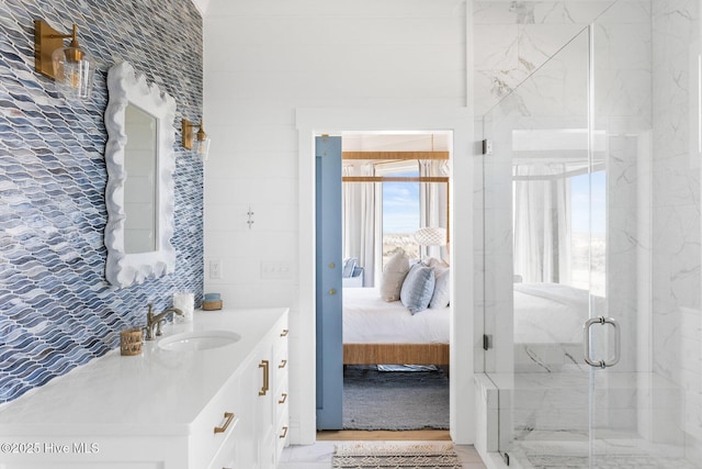 11 Sandspur Trl, Bald Head Island, NC 28461 - ensuite bathroom with vanity, a shower stall, and decorative backsplash