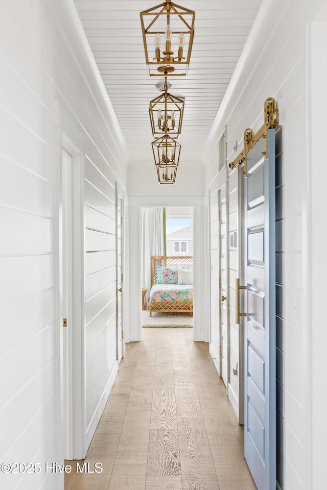 11 Sandspur Trl, Bald Head Island, NC 28461 - hall with a chandelier