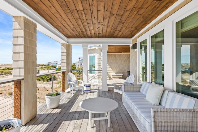 11 Sandspur Trl, Bald Head Island, NC 28461 - deck featuring an outdoor living space
