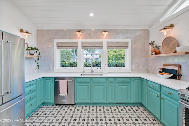 3343 Channelside Dr SW, Supply, NC 28462 - kitchen with stainless steel appliances, open shelves, backsplash, light countertops, and wood ceiling
