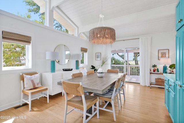 3343 Channelside Dr SW, Supply, NC 28462 - dining area with light wood-style flooring and a chandelier