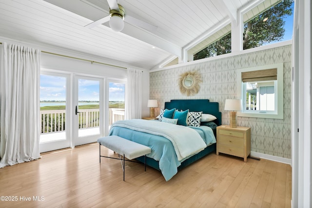 3343 Channelside Dr SW, Supply, NC 28462 - bedroom with access to exterior, light wood-type flooring, a water view, and ceiling fan
