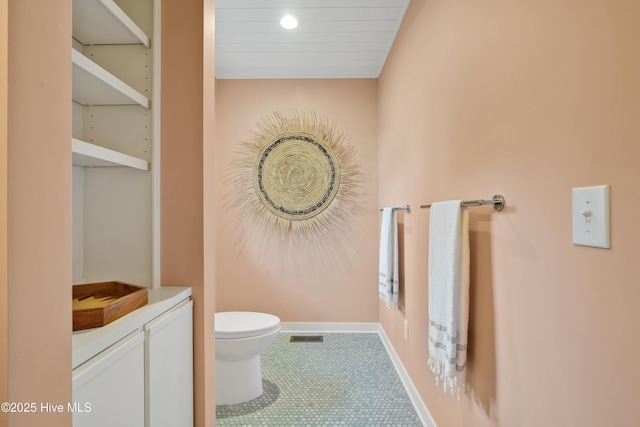 3343 Channelside Dr SW, Supply, NC 28462 - bathroom with toilet and tile patterned flooring
