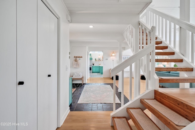 3343 Channelside Dr SW, Supply, NC 28462 - stairway with wood finished floors, recessed lighting, and arched walkways