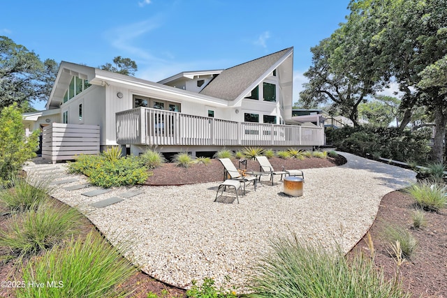 3343 Channelside Dr SW, Supply, NC 28462 - back of house with a wooden deck and a patio