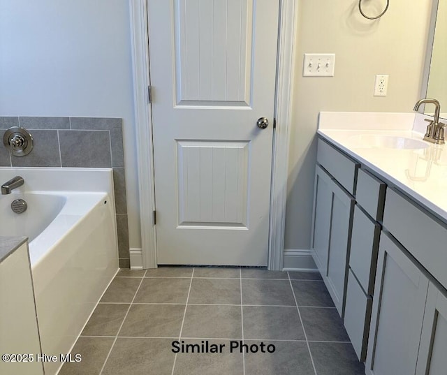 1822 Olde Towne Pointe Blvd, Jacksonville, NC 28546 - full bathroom with a bath, vanity, tile patterned flooring, and baseboards