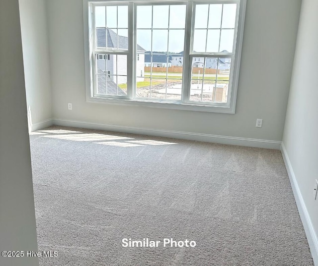 1822 Olde Towne Pointe Blvd, Jacksonville, NC 28546 - carpeted empty room featuring baseboards
