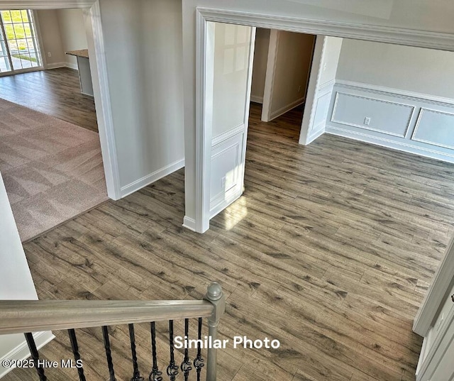 1822 Olde Towne Pointe Blvd, Jacksonville, NC 28546 - unfurnished room with dark wood-style floors, a decorative wall, and baseboards