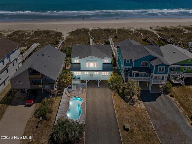 1033 Ocean Blvd W, Holden Beach, NC 28462 - drone / aerial view of expansive coastline and a pool area