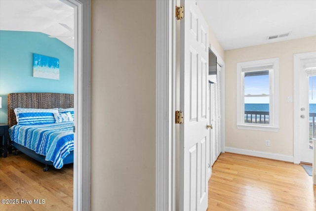 1033 Ocean Blvd W, Holden Beach, NC 28462 - corridor featuring wood finished floors and baseboards