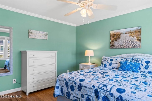 1033 Ocean Blvd W, Holden Beach, NC 28462 - bedroom featuring wood finished floors, crown molding, and a ceiling fan