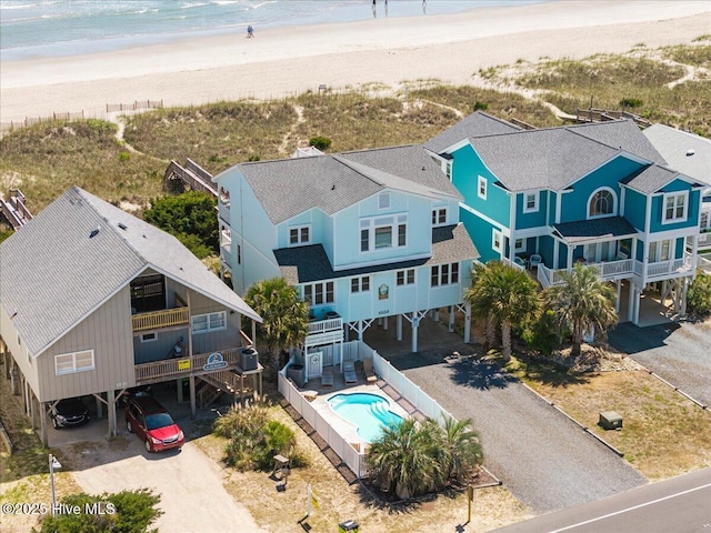 1033 Ocean Blvd W, Holden Beach, NC 28462 - view of subject property with a pool area and unending shoreline