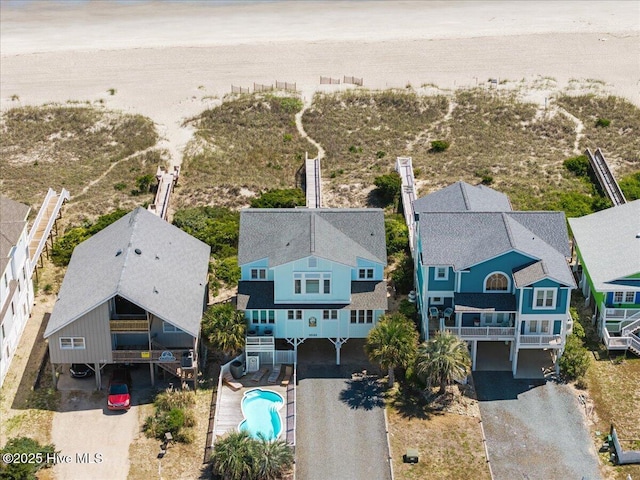 1033 Ocean Blvd W, Holden Beach, NC 28462 - aerial view of residential area featuring a pool area