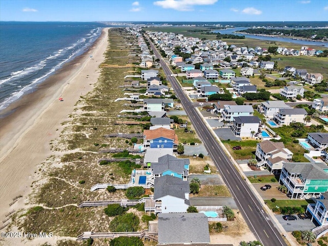 1033 Ocean Blvd W, Holden Beach, NC 28462 - aerial perspective of suburban area with waterfront with a beach