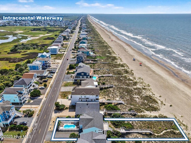 1033 Ocean Blvd W, Holden Beach, NC 28462 - bird's eye view of waterfront with a beach