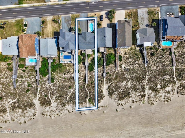 1033 Ocean Blvd W, Holden Beach, NC 28462 - aerial view of property's location featuring nearby suburban area and a pool