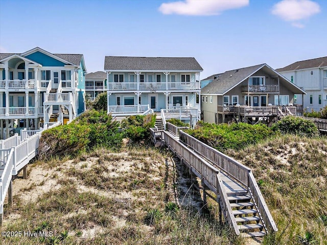 1033 Ocean Blvd W, Holden Beach, NC 28462 - back of property featuring stairway