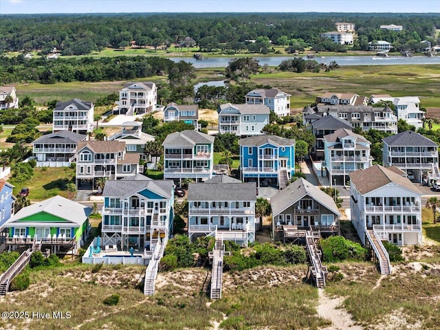 1033 Ocean Blvd W, Holden Beach, NC 28462 - bird's eye view of a large body of water and a forest