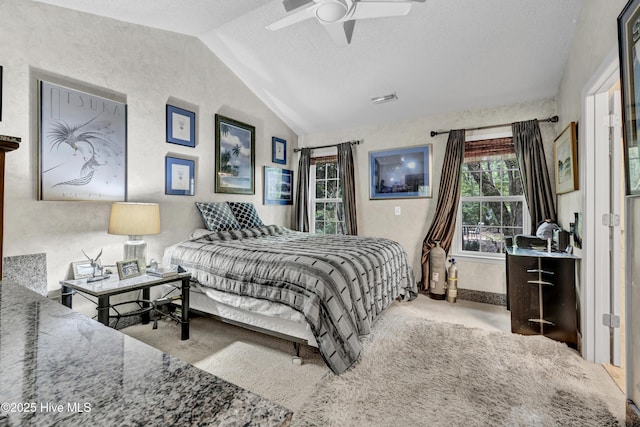 208 Bloomington Ln, Wilmington, NC 28411 - bedroom with lofted ceiling, carpet floors, a textured ceiling, and a ceiling fan