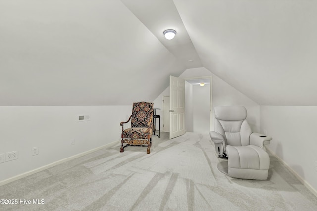 208 Bloomington Ln, Wilmington, NC 28411 - sitting room featuring vaulted ceiling, light colored carpet, and baseboards