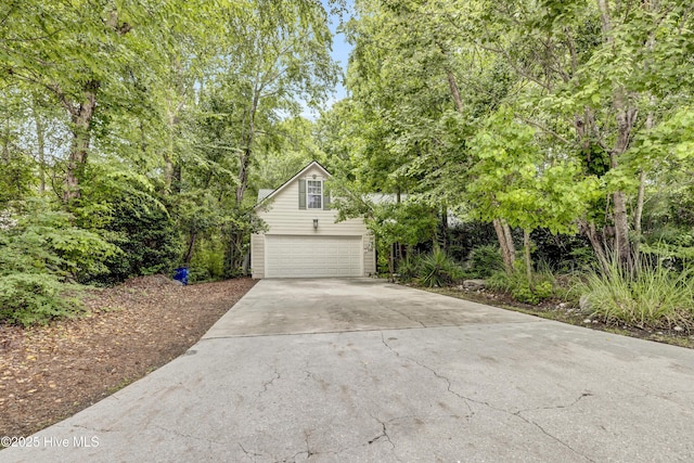 208 Bloomington Ln, Wilmington, NC 28411 - view of front of home with concrete driveway and a garage